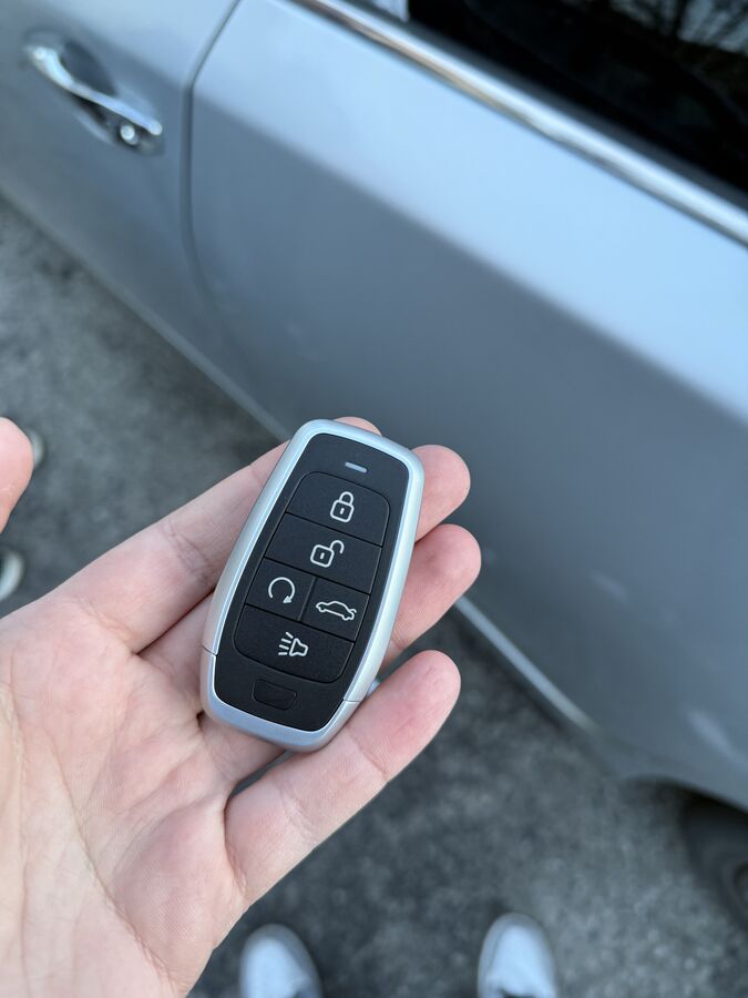 Five button smart key fob programmed to a vehicle by a mobile locksmith in Spokane, WA